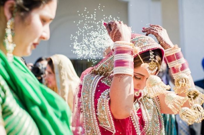Why Do Brides Throw Rice At The Vidai Reason